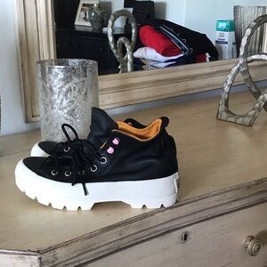 Trendy Black Sneakers with Pink and White Accents